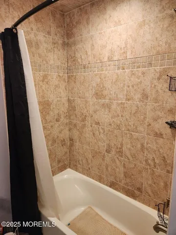 a bathroom with a bathtub