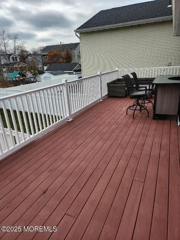 a view of balcony deck and patio