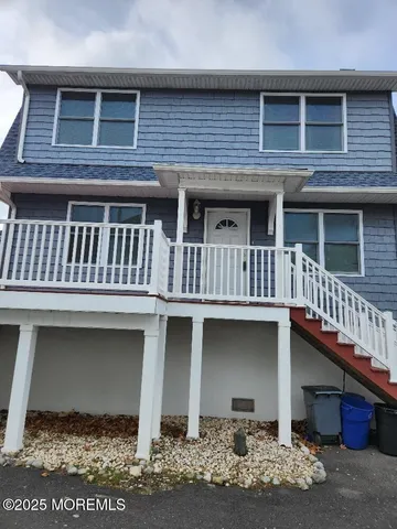 a front view of a house with balcony