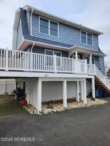 a front view of a house with a garage