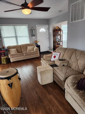 a living room with furniture and a couch