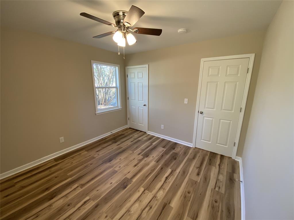 203 Elam Street Mansfield, LA 71052 - Photo 11 of 18 a view of an empty room with a window