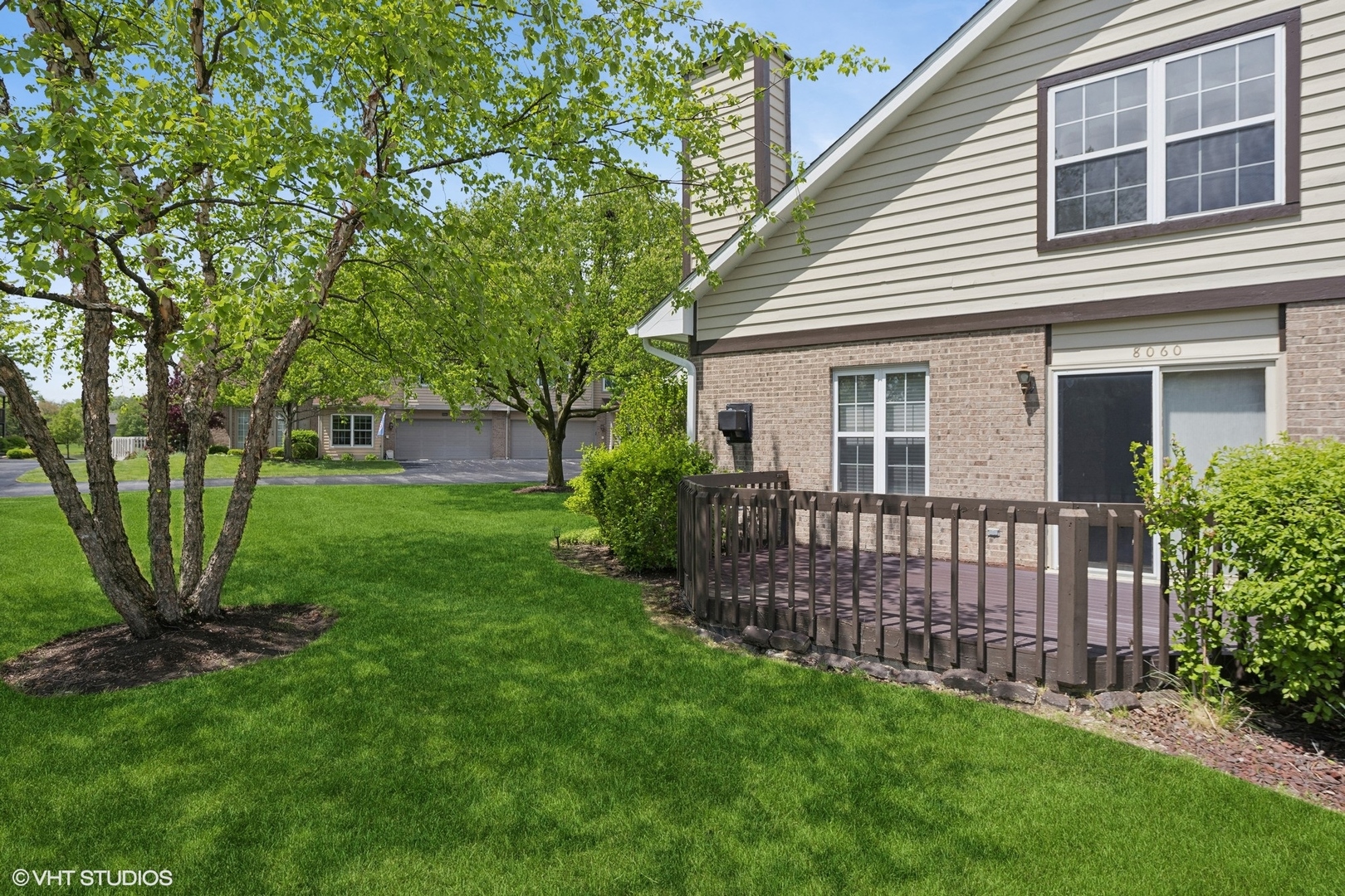 8060 Capra Trail Darien, IL 60561 - Photo 2 of 21 a view of a backyard with a garden