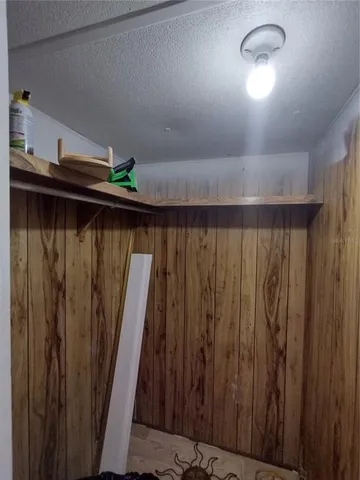 a view of a balcony with wooden floor