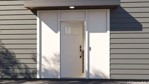 a view of a kitchen with a table and chairs