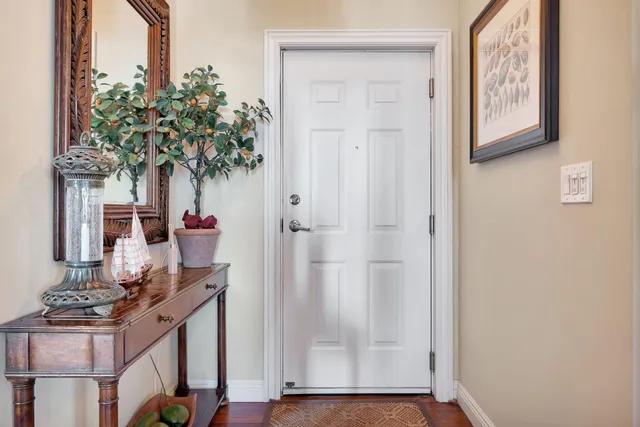 a view of a chair and table in the balcony