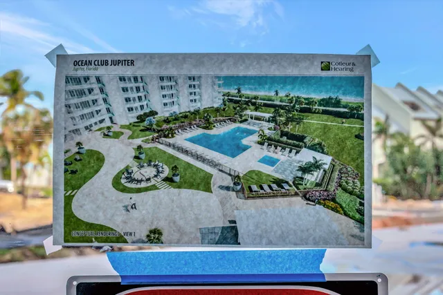 a room with pool table and window