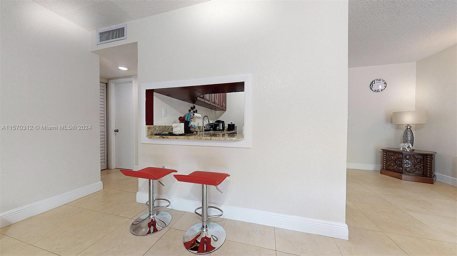 9483 Southwest 76th Street, Unit N3 Miami, FL 33173 - Photo 15 of 27 a room with furniture and wooden floor