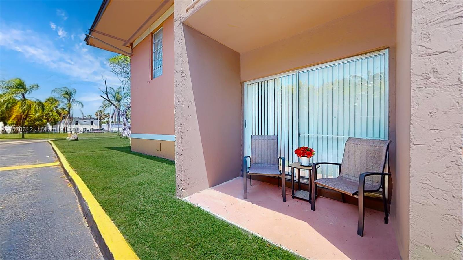 9483 Southwest 76th Street, Unit N3 Miami, FL 33173 - Photo 20 of 27 a balcony with chairs and with outdoor views