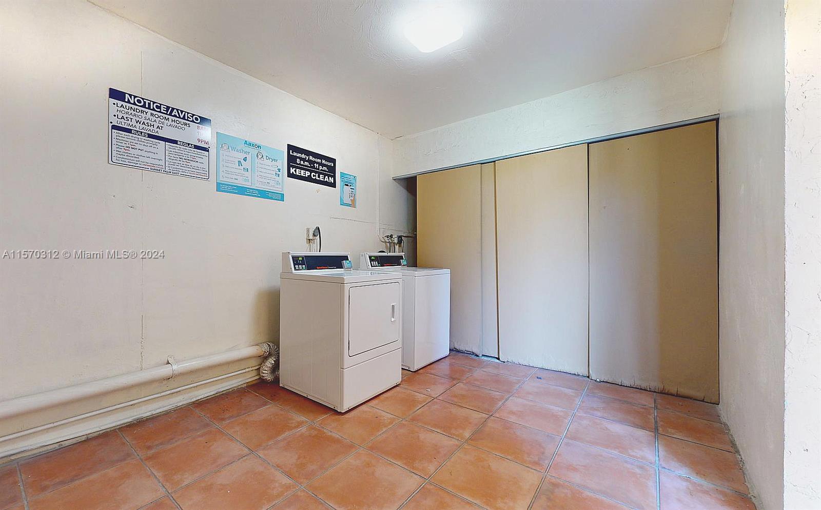 9483 Southwest 76th Street, Unit N3 Miami, FL 33173 - Photo 23 of 27 a view of a storage & utility room with a window