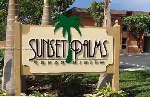 9483 Southwest 76th Street, Unit N3 Miami, FL 33173 - Photo 25 of 27 a street sign that is on a pole