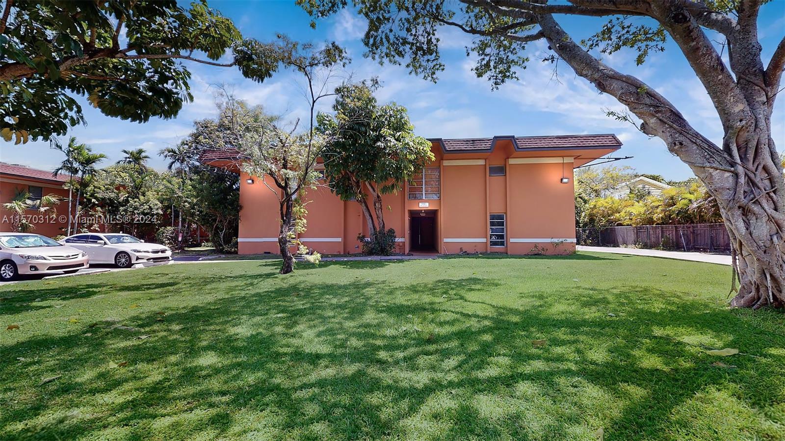 9483 Southwest 76th Street, Unit N3 Miami, FL 33173 - Photo 6 of 27 a view of a backyard with a garden