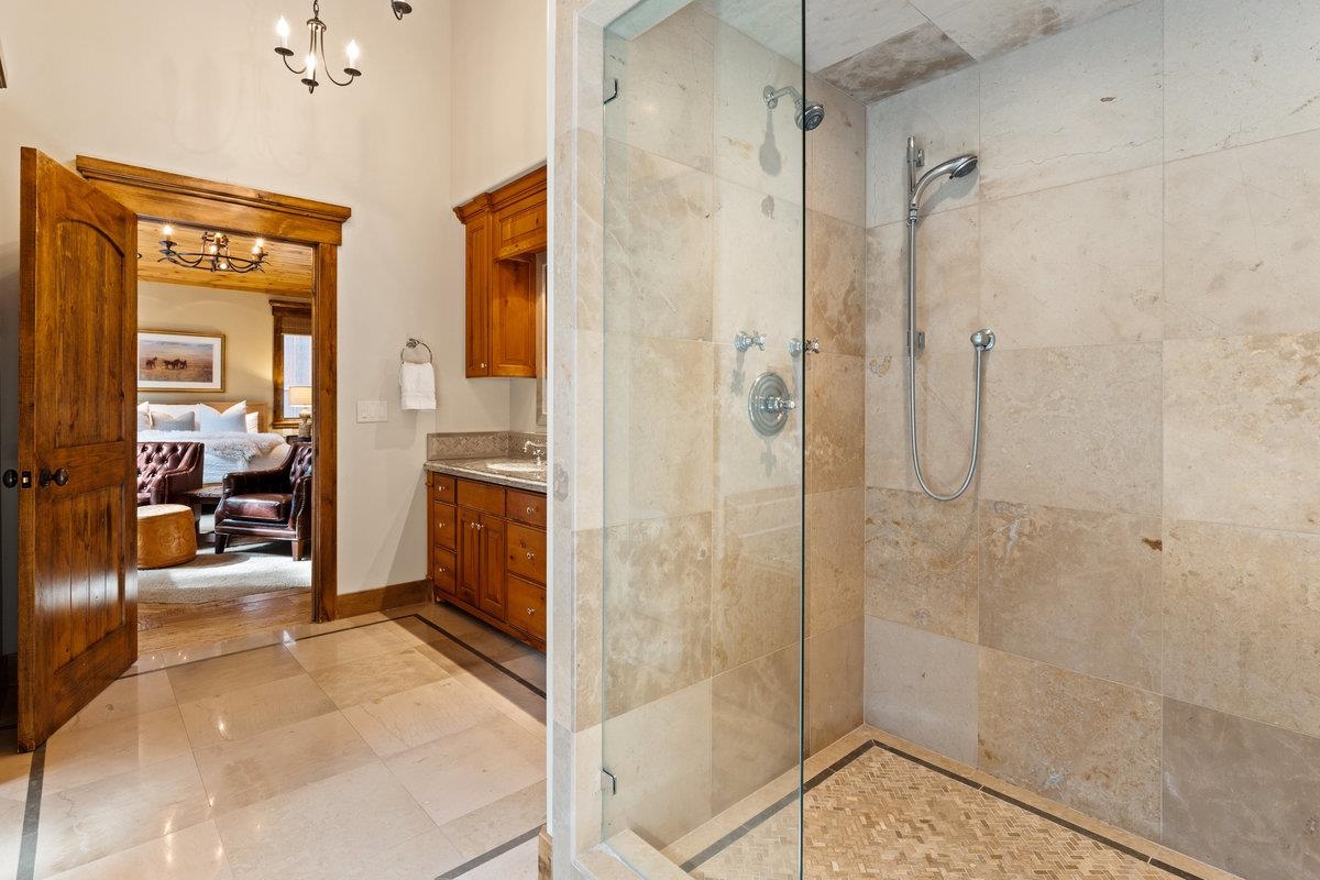 12043 Brookstone Drive Truckee, CA 96161 - Photo 16 of 21 a bathroom with a shower and a sink