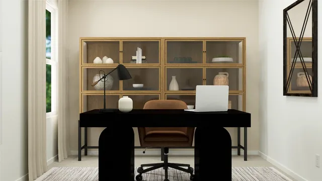 a dining room with a table and chairs