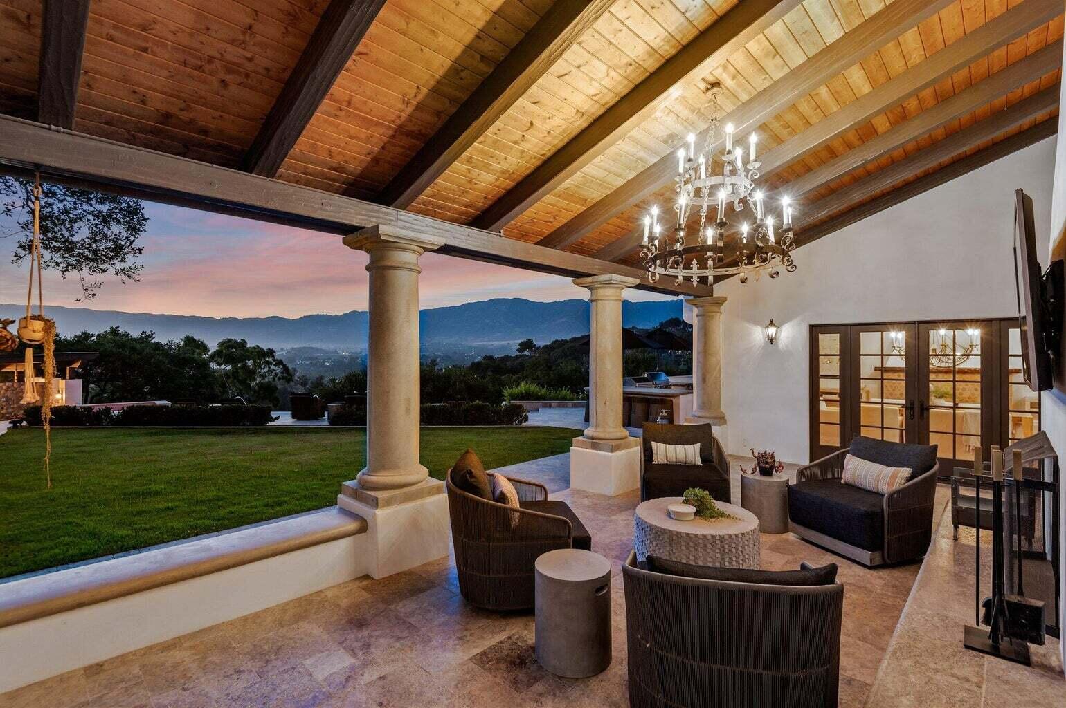 695 Via Hierba Santa Barbara, CA 93110 - Photo 13 of 70 a view of a patio with couches chairs dining table and chairs