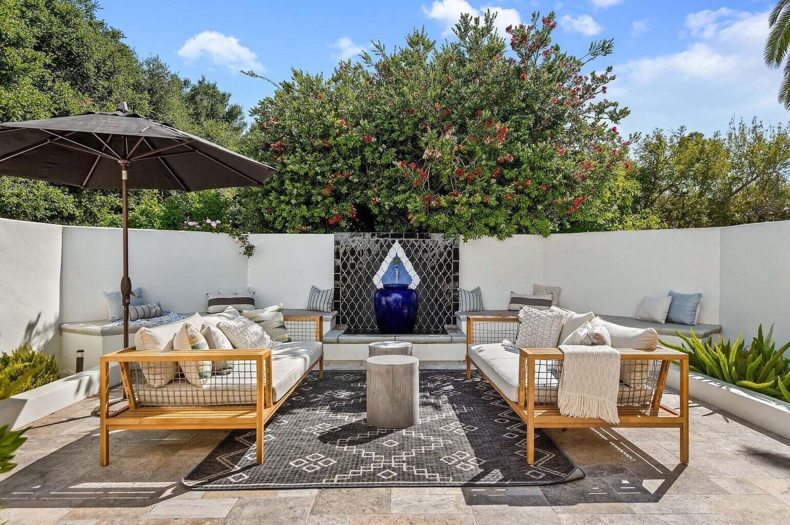 695 Via Hierba Santa Barbara, CA 93110 - Photo 18 of 70 a view of a patio with furniture and table