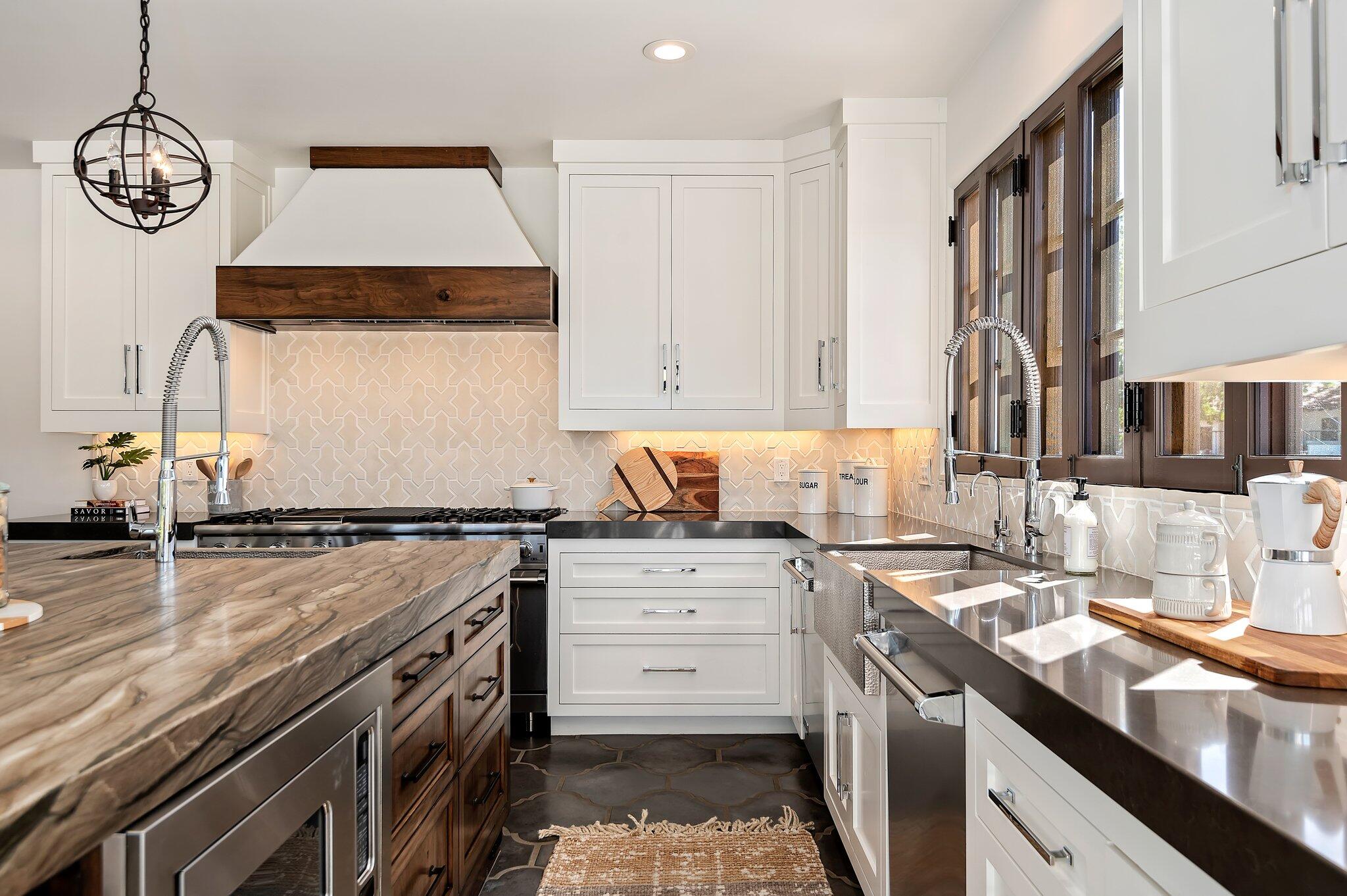 695 Via Hierba Santa Barbara, CA 93110 - Photo 21 of 70 a kitchen with a stove cabinets and a wooden floor