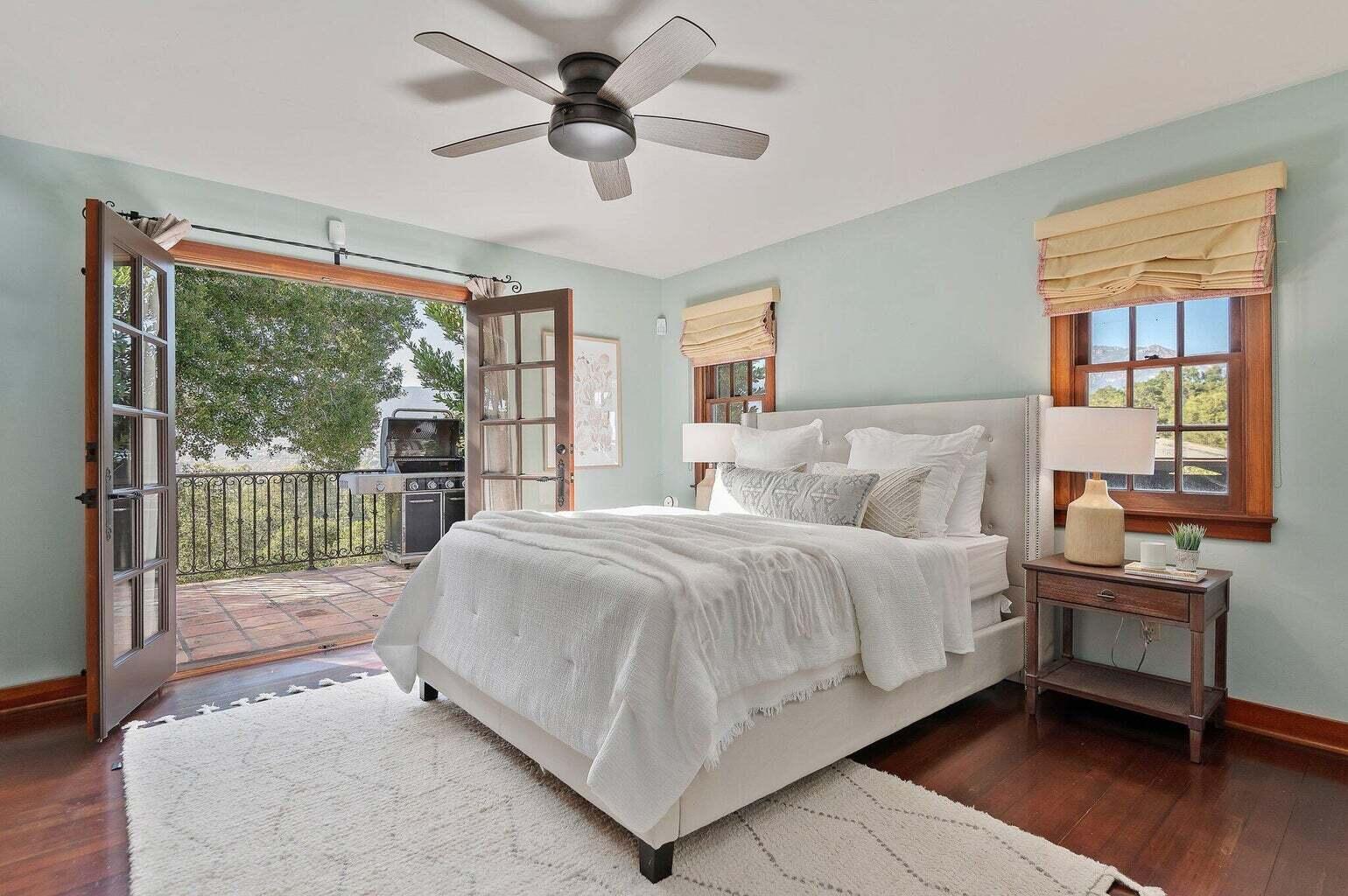 695 Via Hierba Santa Barbara, CA 93110 - Photo 41 of 70 a spacious bedroom with a bed and a large window