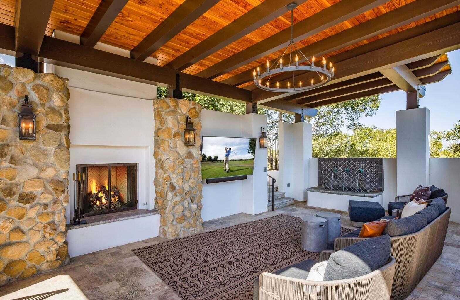 695 Via Hierba Santa Barbara, CA 93110 - Photo 57 of 70 a living room with furniture and a fireplace