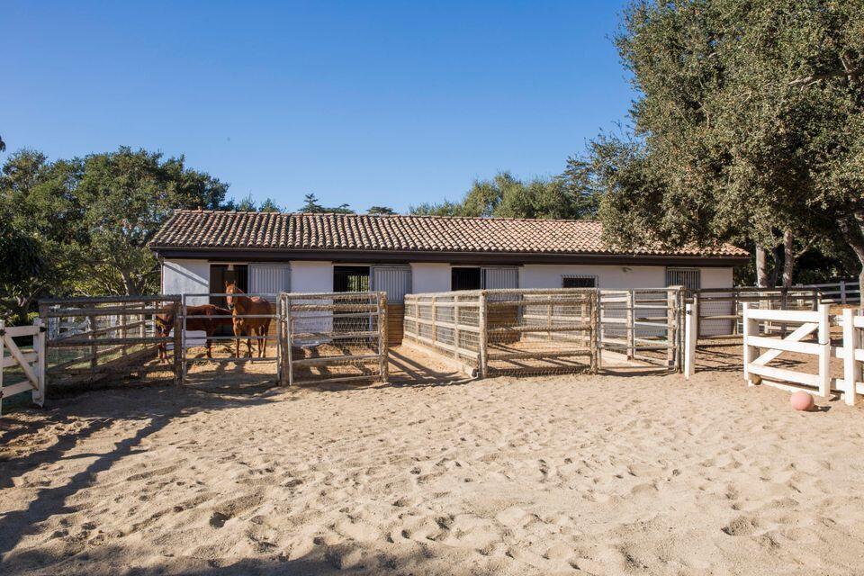 695 Via Hierba Santa Barbara, CA 93110 - Photo 61 of 70 a front view of a house with a yard covered in snow