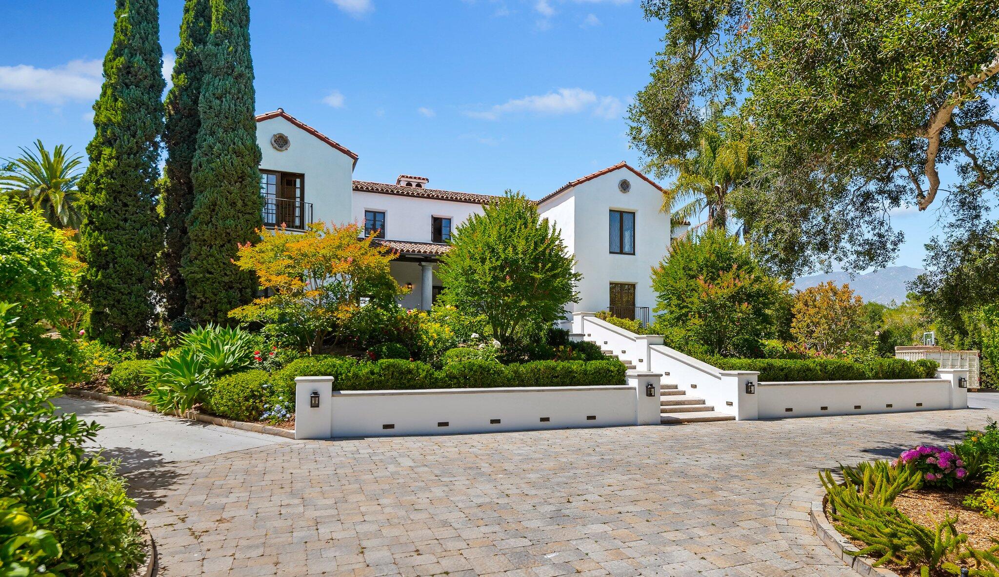 695 Via Hierba Santa Barbara, CA 93110 - Photo 63 of 70 a front view of a house with a yard and garage