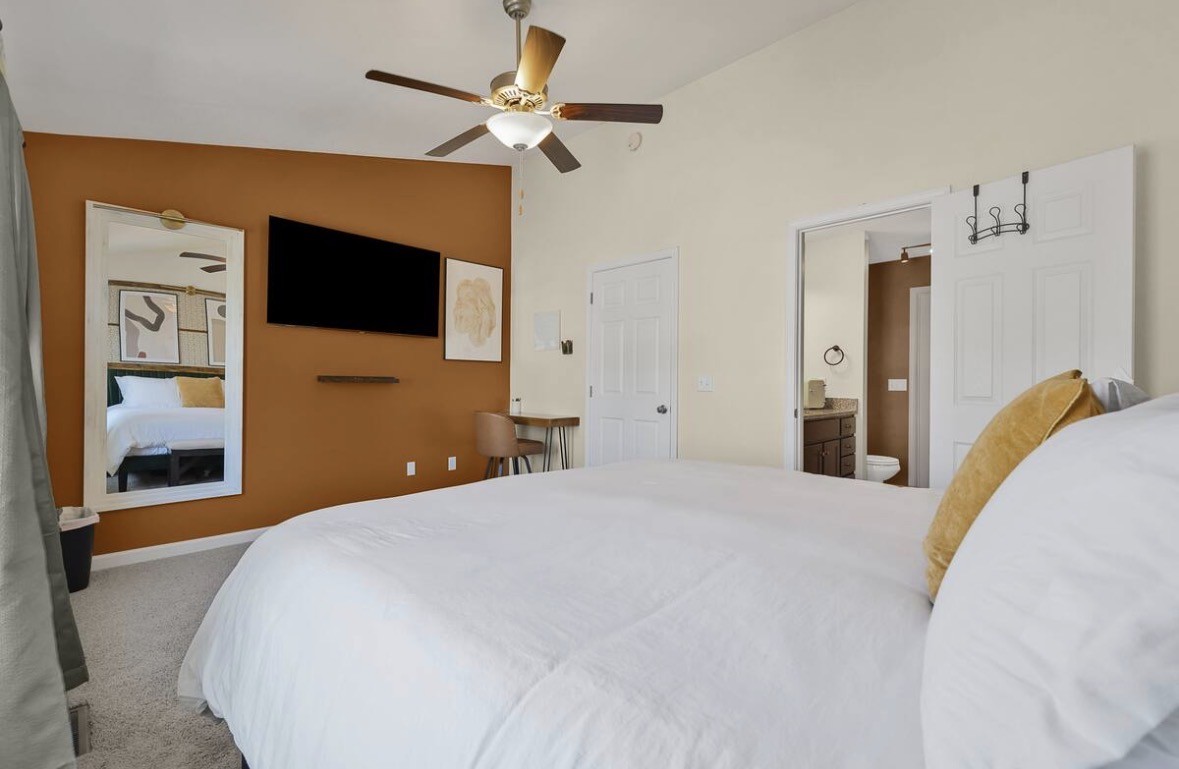 1382 Rural Hill Road, Unit 364 Antioch, TN 37013 - Photo 15 of 22 a bedroom with a bed and a flat screen tv