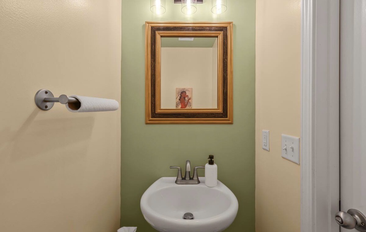 1382 Rural Hill Road, Unit 364 Antioch, TN 37013 - Photo 8 of 22 a bathroom with a sink a mirror and vanity