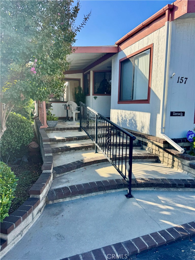 8651 Foothill, Unit 157 Rancho Cucamonga, CA 91730 - Photo 3 of 13 a view of backyard with deck and outdoor seating