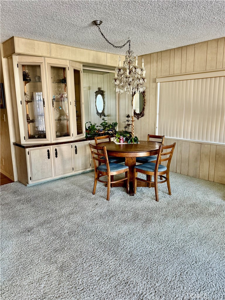 8651 Foothill, Unit 157 Rancho Cucamonga, CA 91730 - Photo 6 of 13 a view of a workspace with furniture and a window