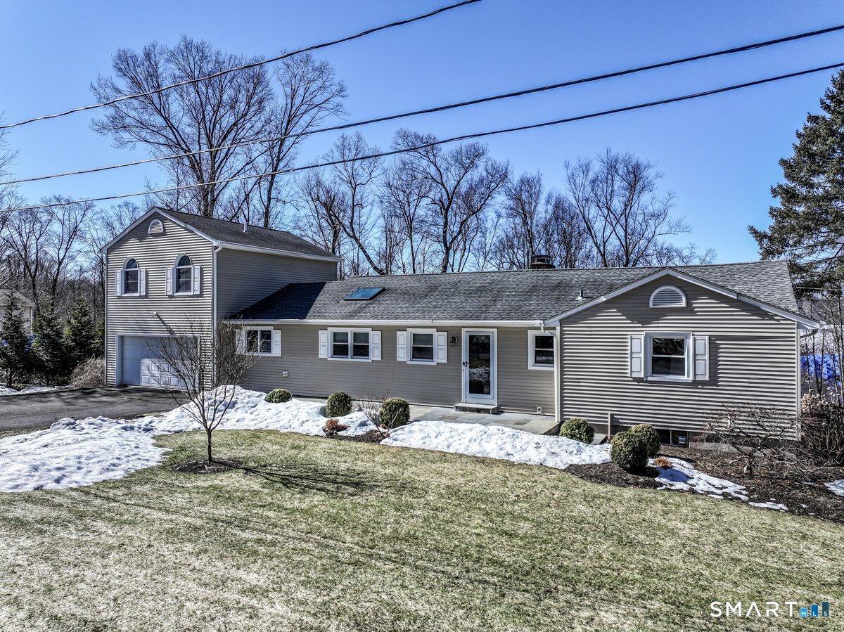 12 South Mountain Road Brookfield, CT 06804 - Photo 30 of 39 a front view of a house with a yard covered in snow