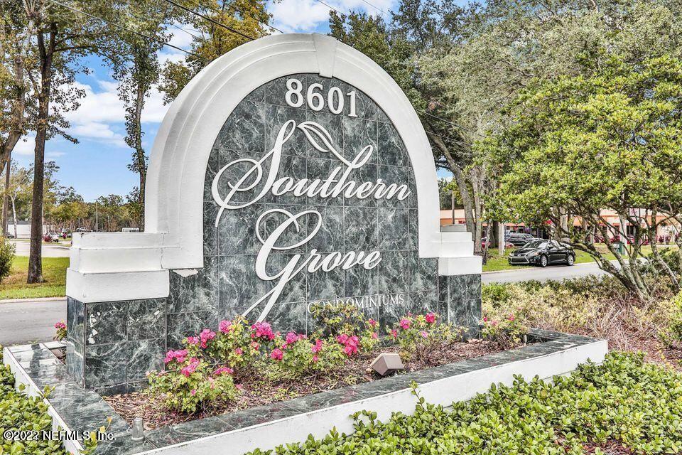 8601 Beach Boulevard, Unit 511 Jacksonville, FL 32216 - Photo 2 of 25 a view of sign board with flower around