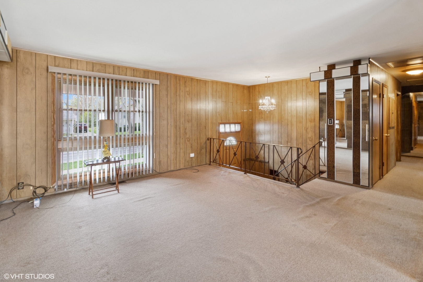1096 Valley Stream Drive Wheeling, IL 60090 - Photo 4 of 27 a view of an empty room with windows