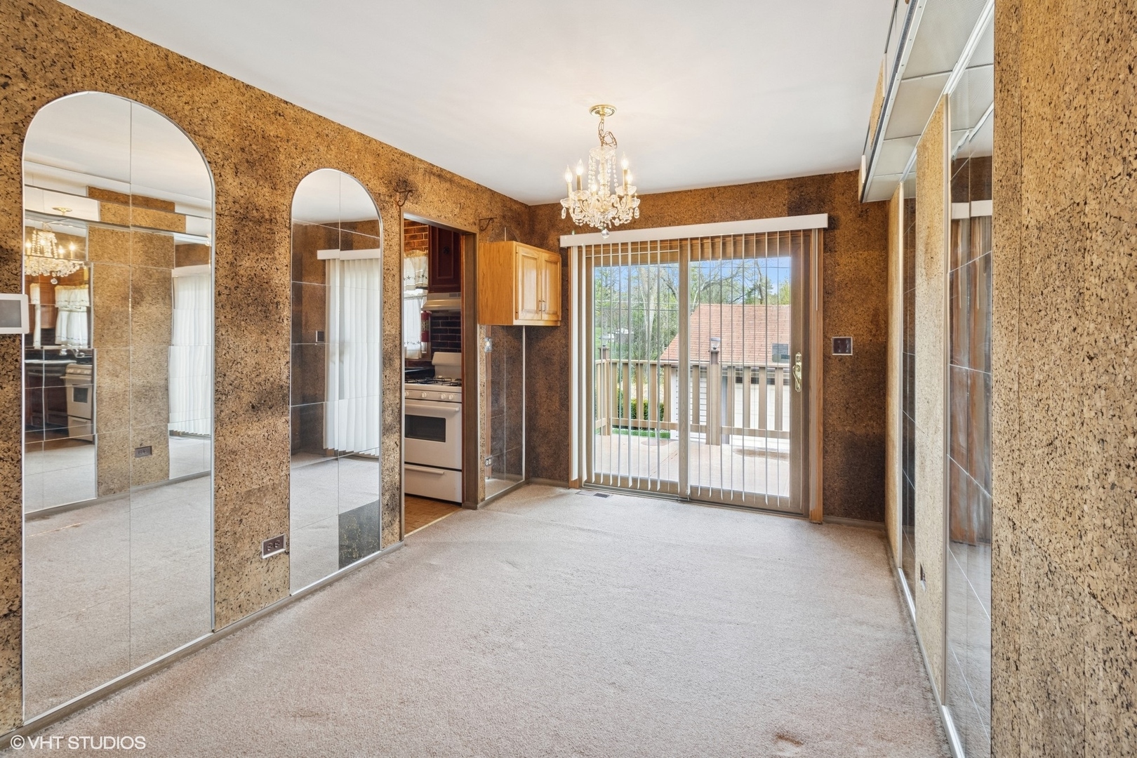 1096 Valley Stream Drive Wheeling, IL 60090 - Photo 6 of 27 a view of a hallway with windows and chandelier