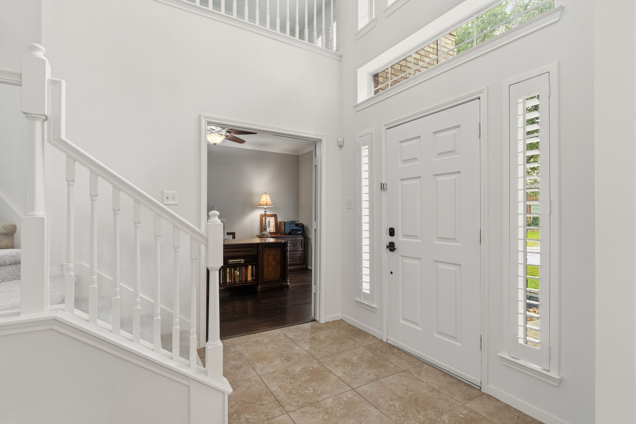 8419 Marchelle Lane Spring, TX 77379 - Photo 14 of 42 a view of a hallway with dining room and stairs