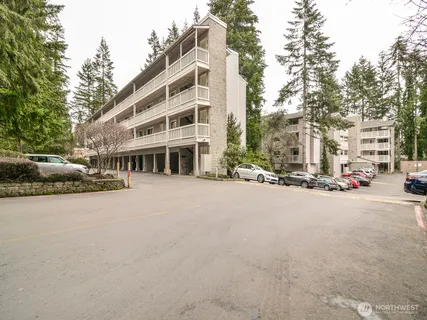 a view of a street with a building in the background