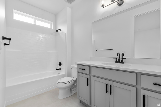 1869 South 2425 West Ogden, UT 84401 - Photo 17 of 22 Bathroom with vanity and shower / washtub combination