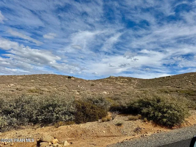 a view of mountains and valleys