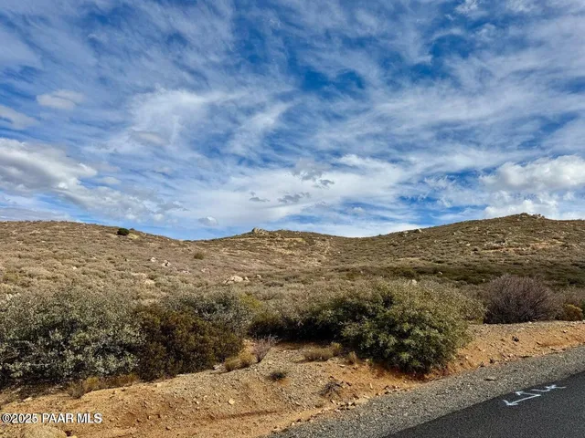 a view of ocean and mountain