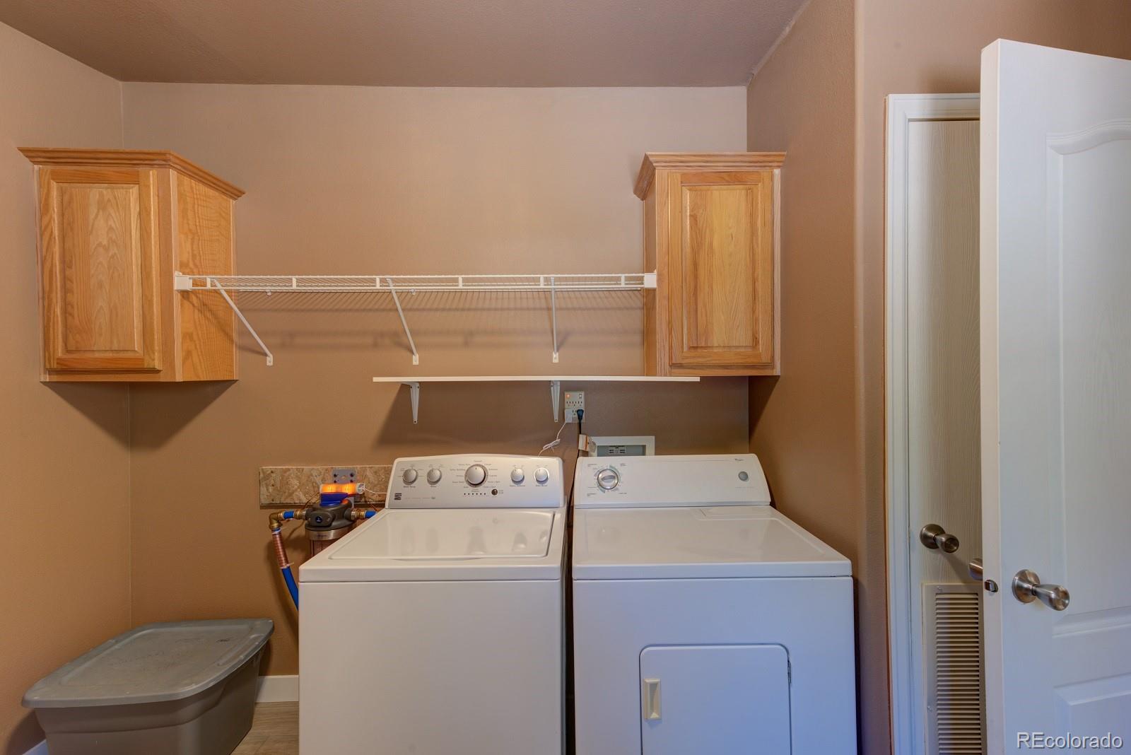 1373 Singletree Road Hartsel, CO 80449 - Photo 34 of 40 a utility room with dryer and washer