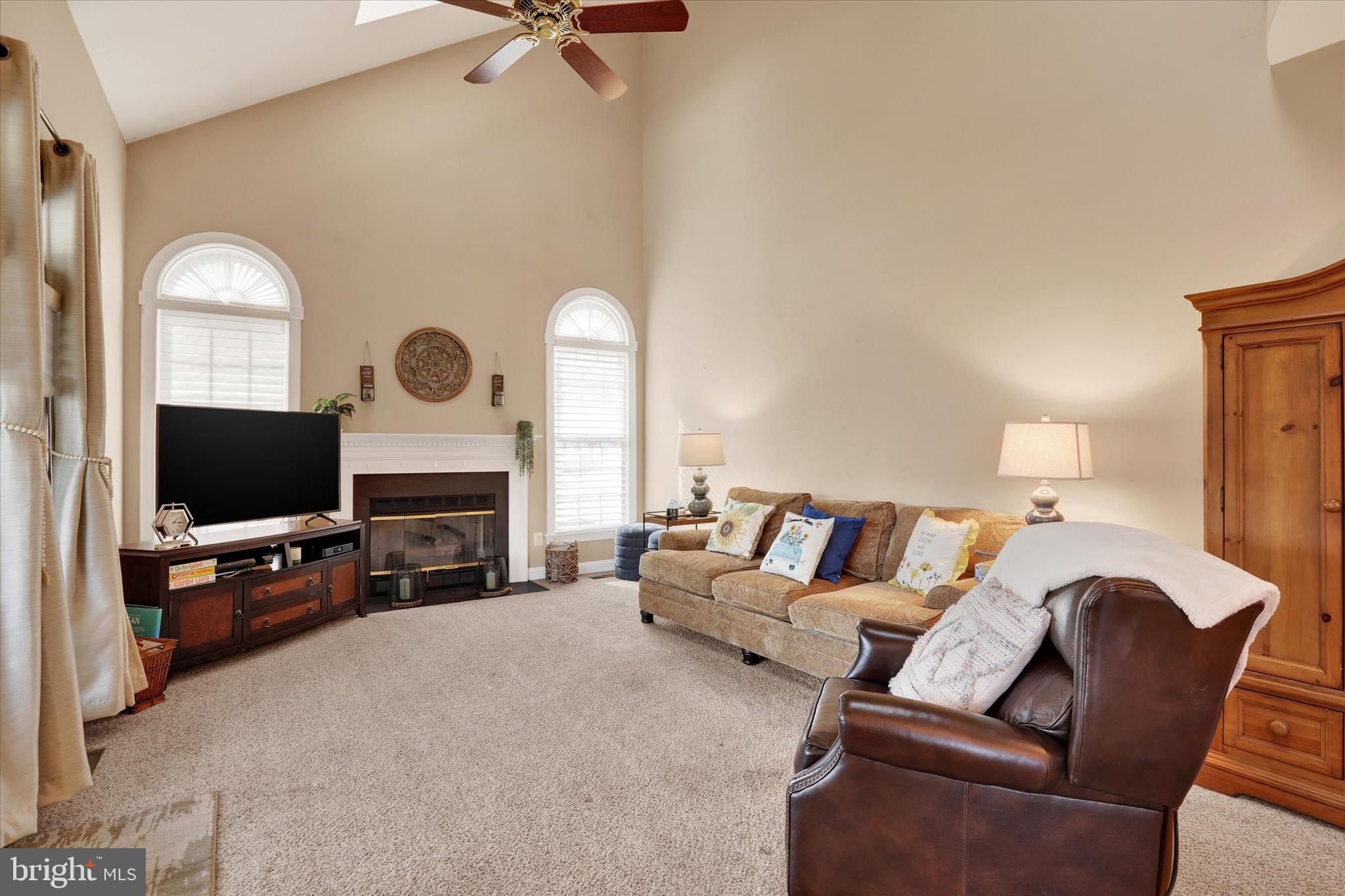 4615 Twinbrook Circle Doylestown, PA 18902 - Photo 12 of 30 a living room with furniture and a flat screen tv