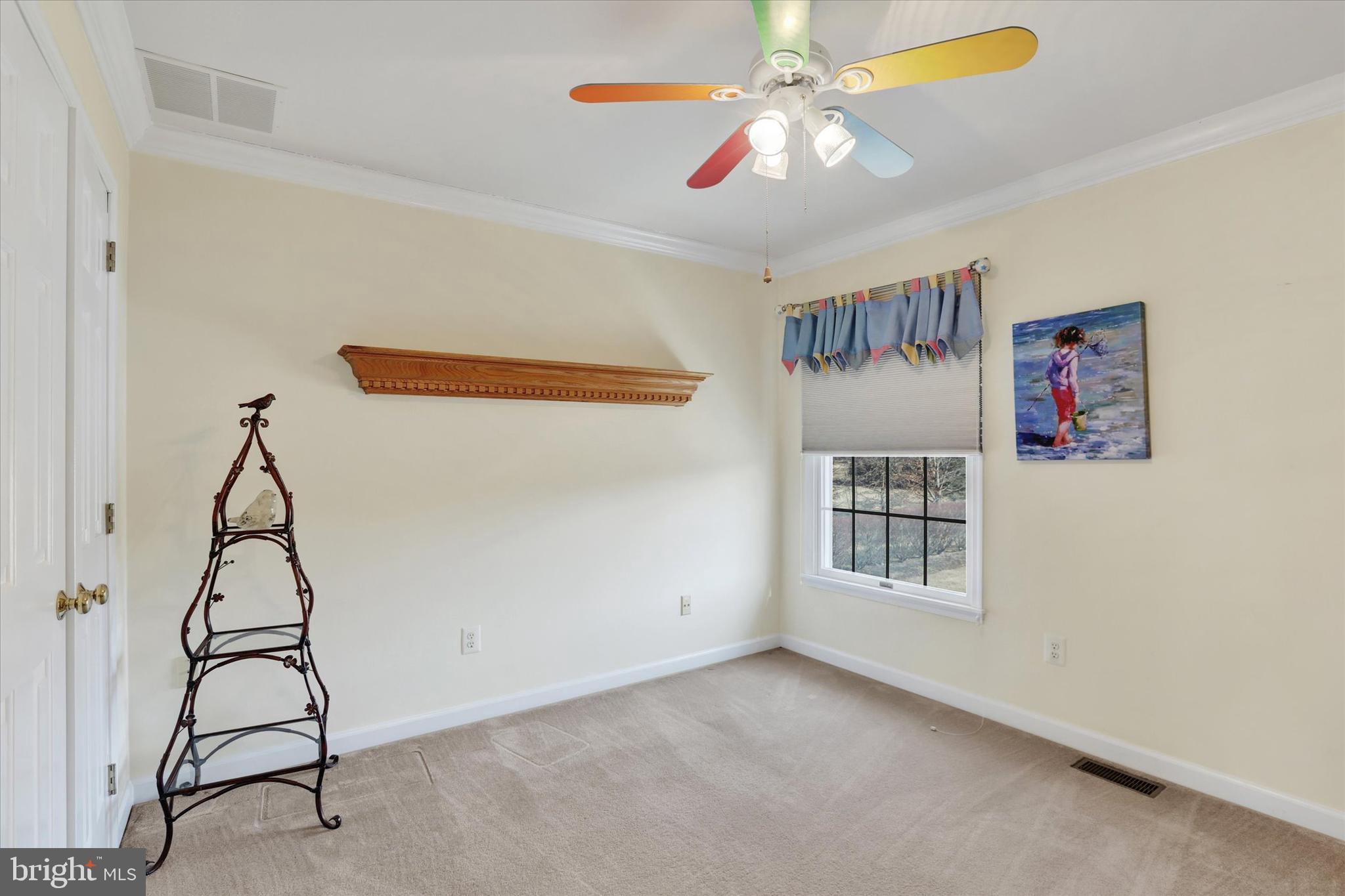 4615 Twinbrook Circle Doylestown, PA 18902 - Photo 23 of 30 a view of a livingroom with a ceiling fan and window