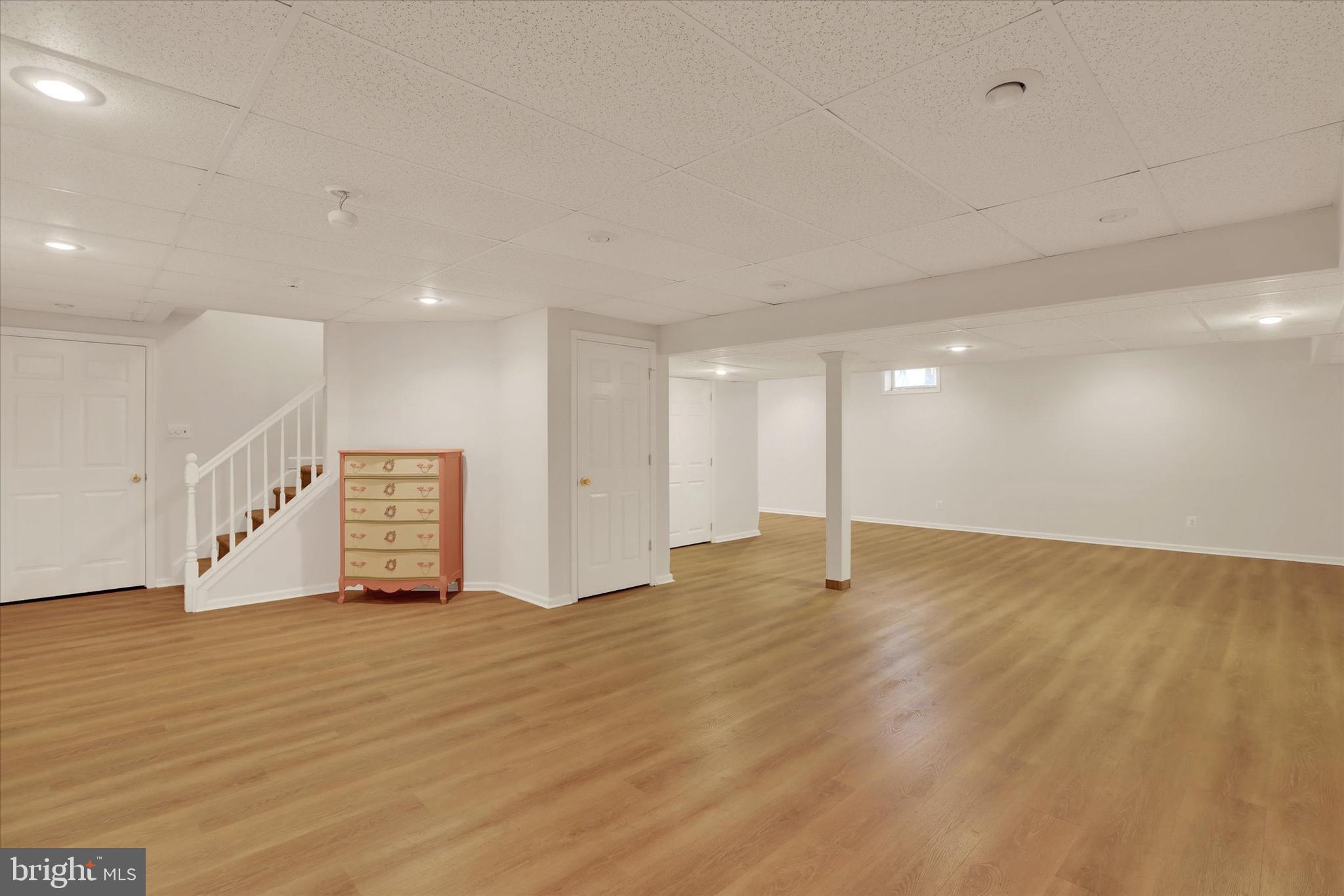 4615 Twinbrook Circle Doylestown, PA 18902 - Photo 25 of 30 a view of an empty room with wooden floor