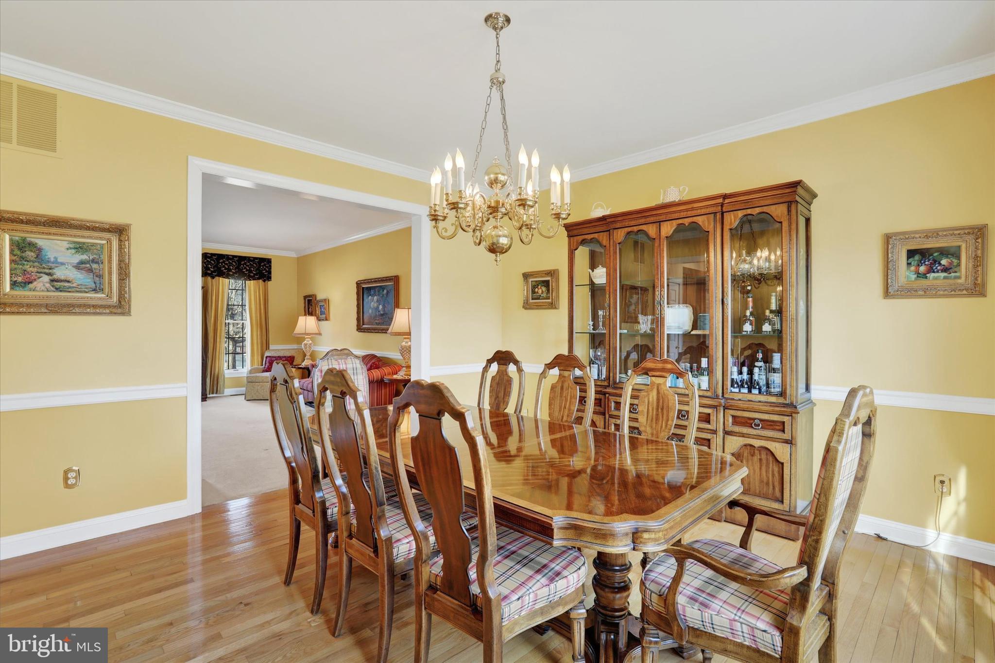 4615 Twinbrook Circle Doylestown, PA 18902 - Photo 7 of 30 a dining room with furniture and chandelier