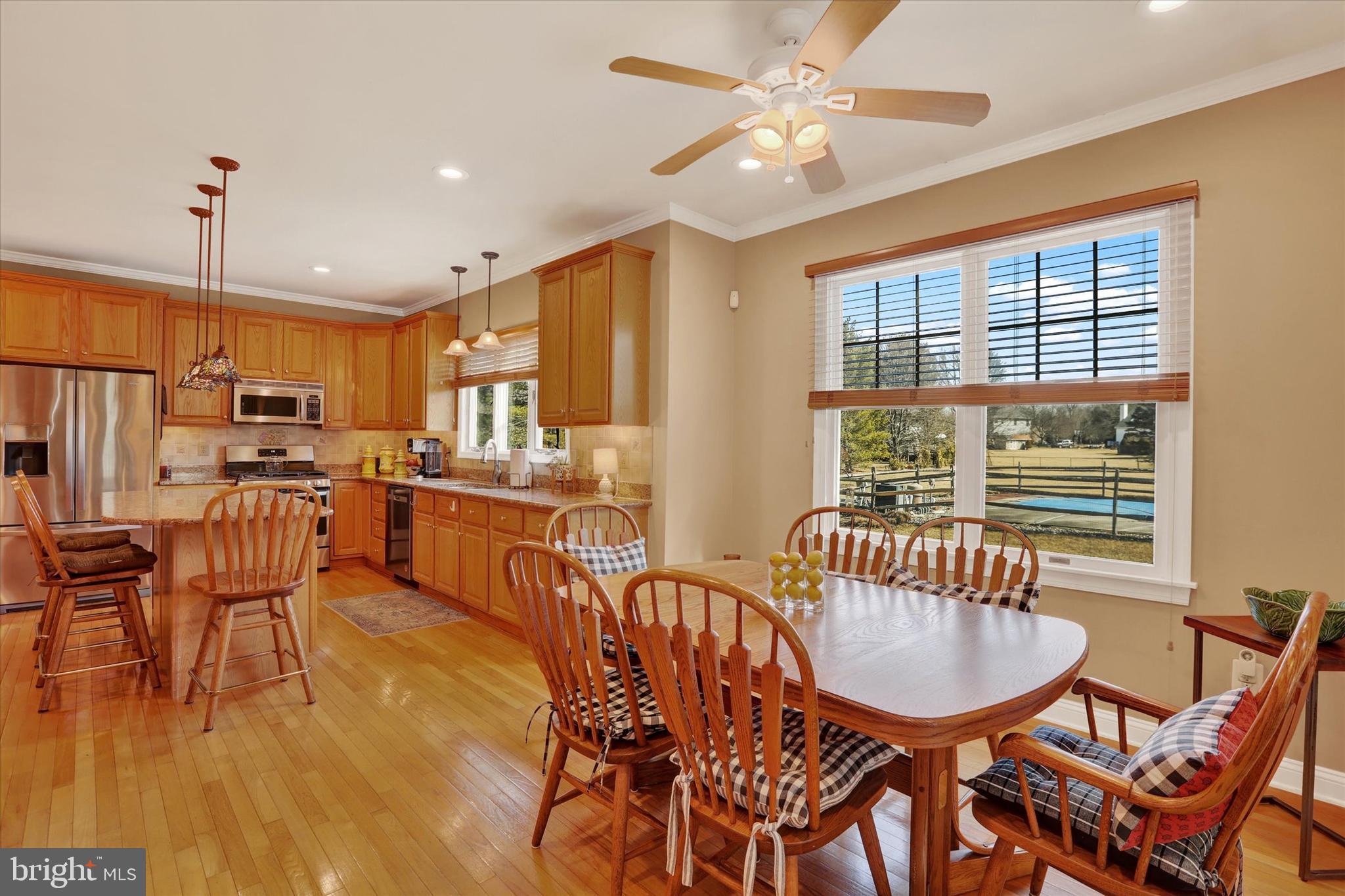 4615 Twinbrook Circle Doylestown, PA 18902 - Photo 10 of 30 a view of a dining room with furniture window and outside view