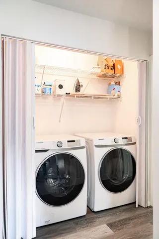 a utility room with dryer and washer