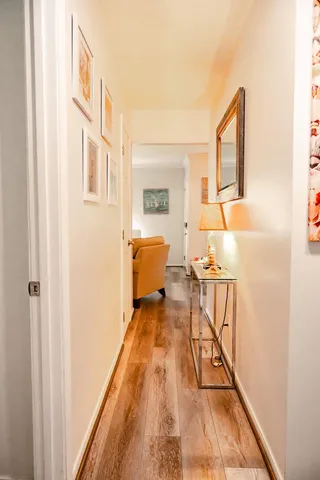 a bedroom with a bed and a baby crib