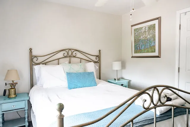 a view of a dining room with furniture and window