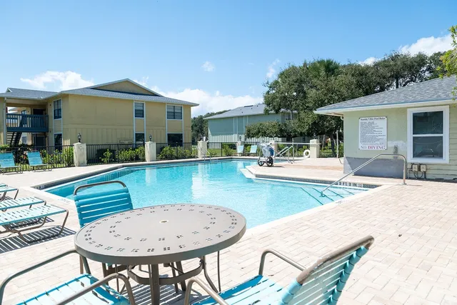 a view of a house with a swimming pool