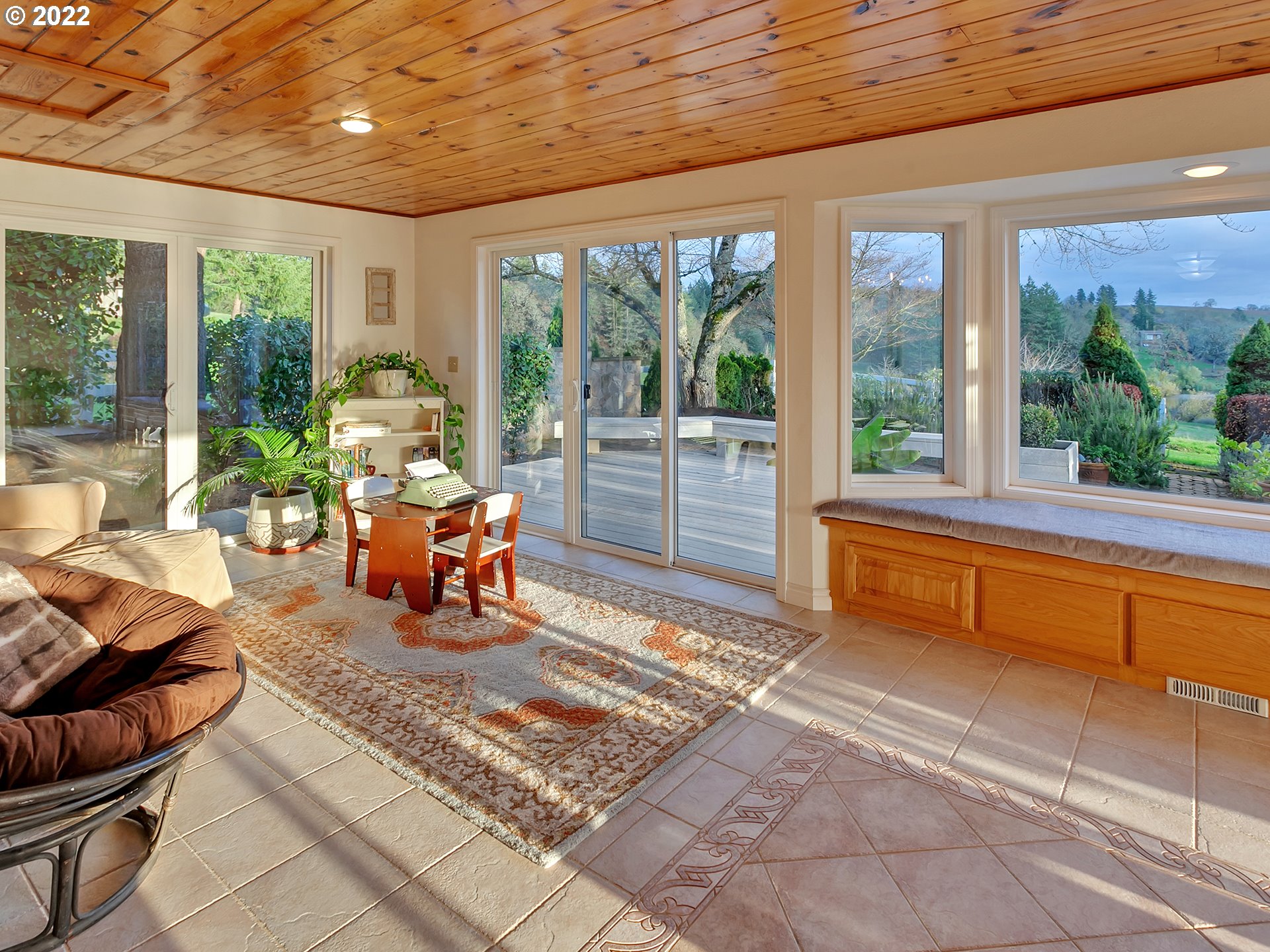 10292 Liberty Road South Salem, OR 97306 - Photo 6 of 32 a living room filled with furniture and large windows