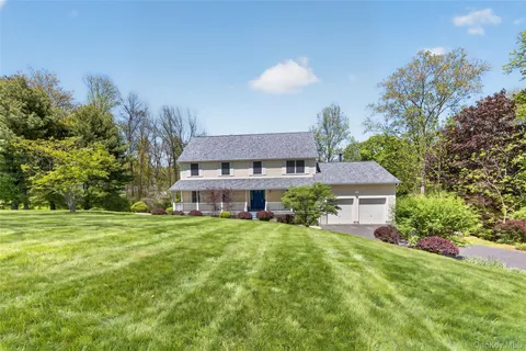 a house view with a garden space